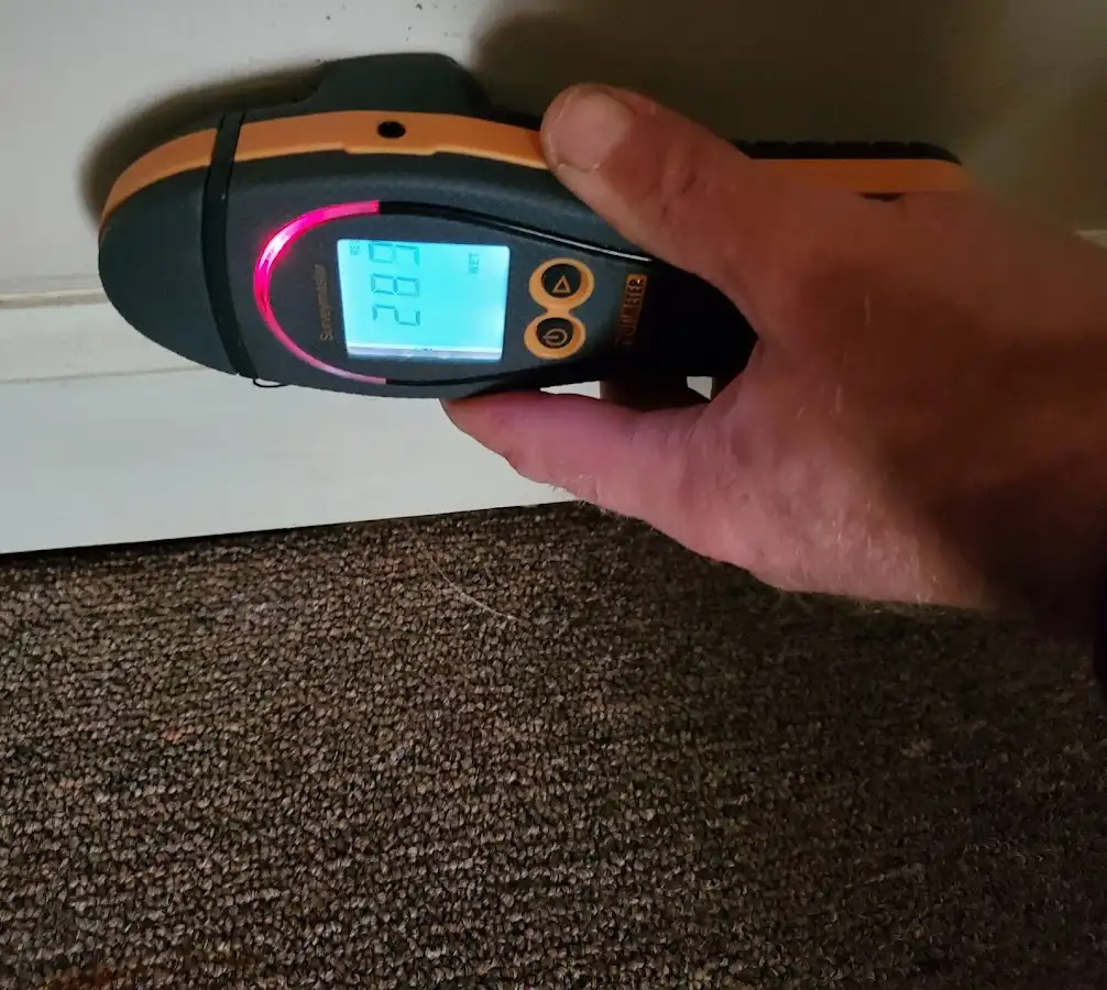 Moisture detection at baseboard during Burst Pipe Cleanup in Los Ranchos de Albuquerque